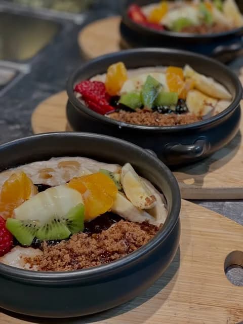 Porridge with banana and berries at The Peacock